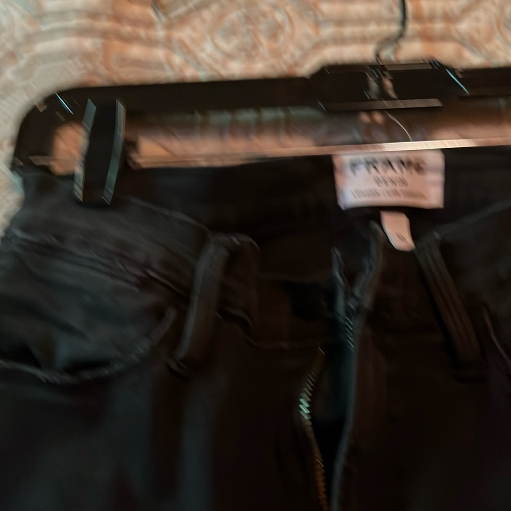 Black distressed in the knees size 30 frame like new